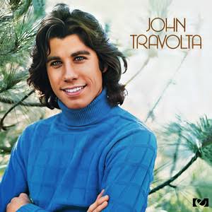Vintage album cover portrait of a young man in a blue sweater
